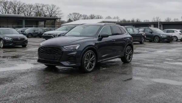 Smartphone photo from the lot: typically shaky, car at an angle